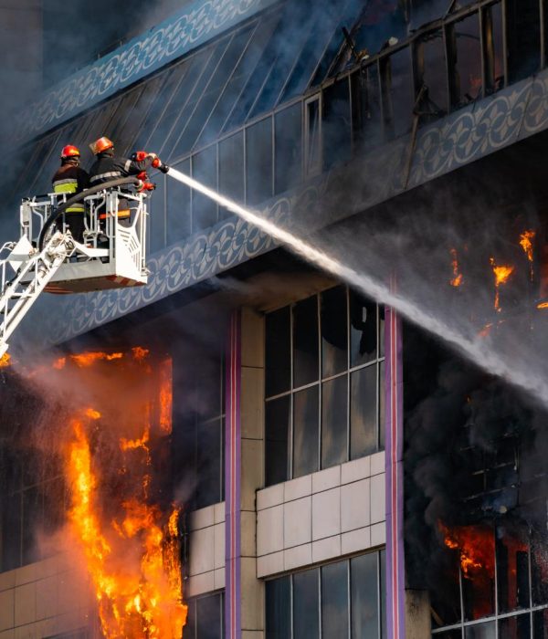 closeup-of-firefighters-on-the-stairs-extinguish-a-2023-11-27-04-45-21-utc