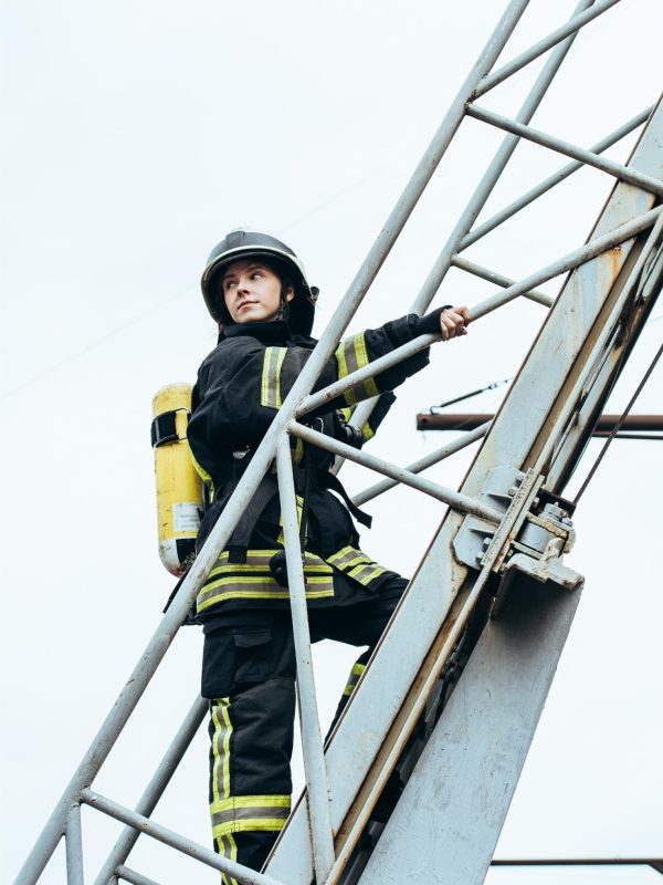 female-firefighter-in-protective-uniform-and-helme-2023-11-27-05-02-58-utc