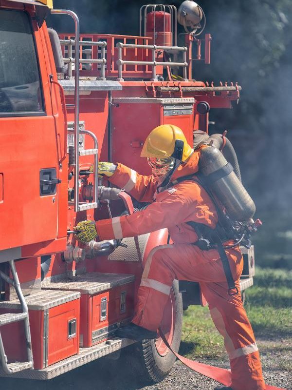 firefighter-wearing-fire-protection-suite-and-oxyg-2023-11-27-04-50-10-utc