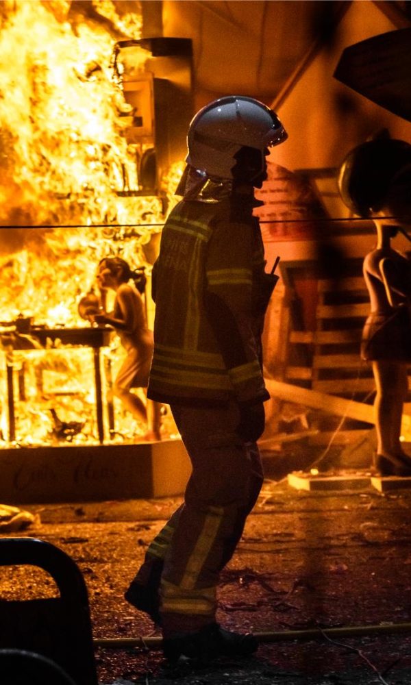 silhouette-of-fireman-trying-to-control-a-fire-in-2023-11-27-05-01-40-utc